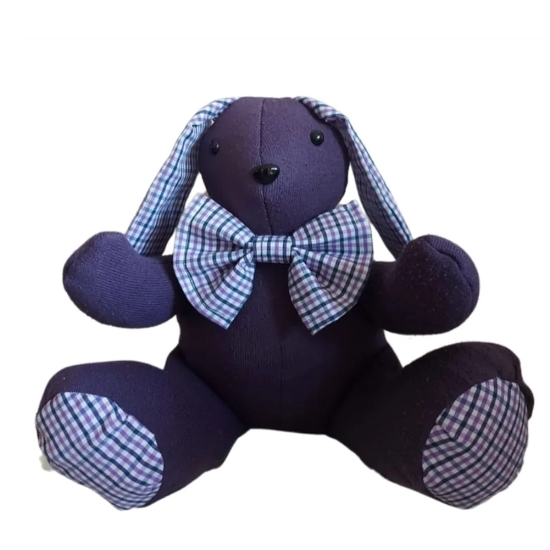 Ashes memory bunny made from deep purple fabric with purple gingham ears, paw pads and a large gingham bow