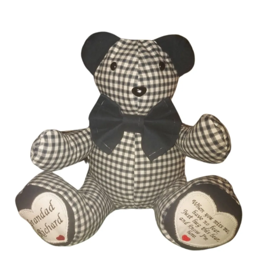 Voice box memory bear made from navy gingham with plain navy ears and hearts embroidered with a name and poem