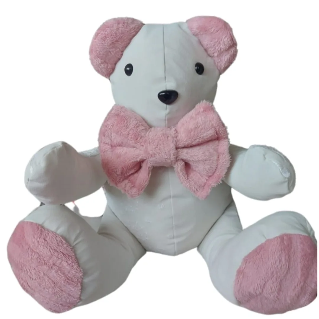 Voice box memory bear made from cream fabric with soft pink ears, paw pads and a large pink bow
